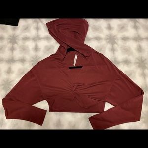 Brand: Fabletics 
Liv Twist Front Hoodie
Size: XXS
Color: Port Wine